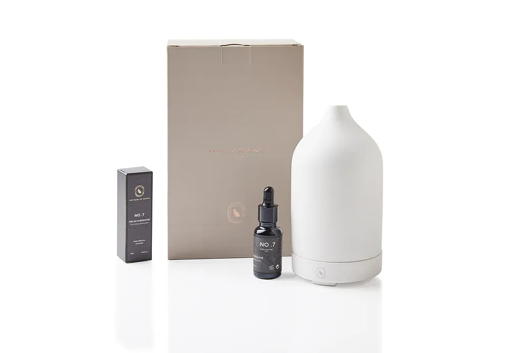 Aroma: Vetiver Lemon Tea Tree to Relax Breathe. Fragrant essential oil in protective packaging.
