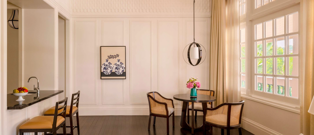 AOSLuxe commercial cold-air HVAC scent diffuser installed in a luxury showflat living room gallery at Raffles Singapore by Artisan of Sense.