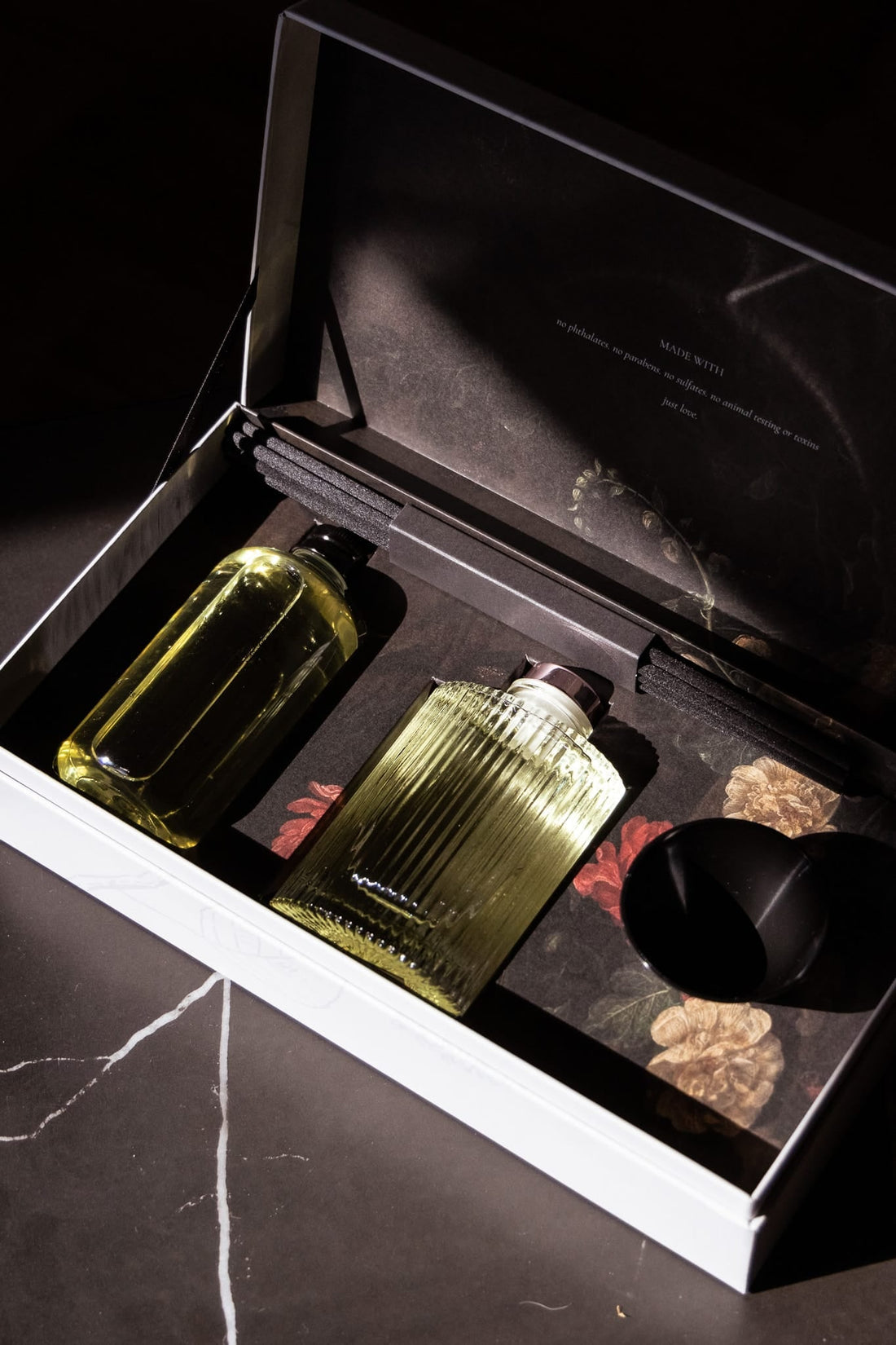 Artisan of Sense alcohol free glass reed diffuser on marble table in Singapore home