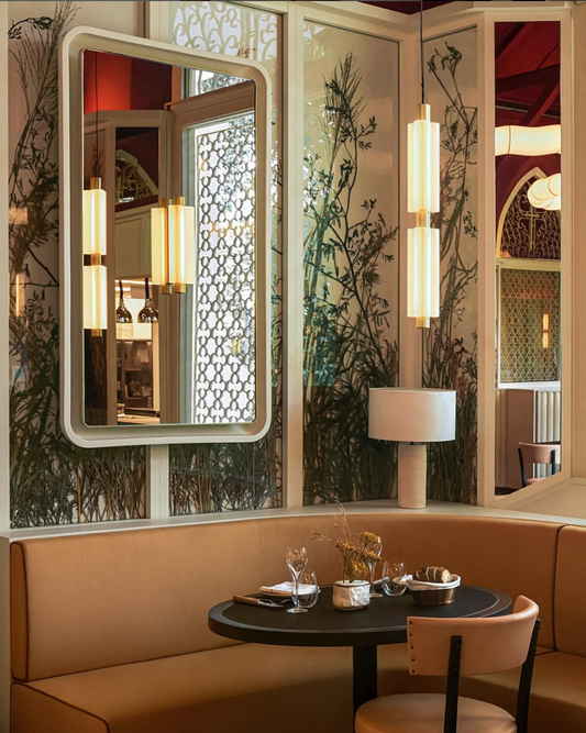 Luxury dining space interior at Claudine Restaurant featuring custom spatial scenting and tailored fragrance design for fine dining hospitality in Singapore by Artisan of Sense.