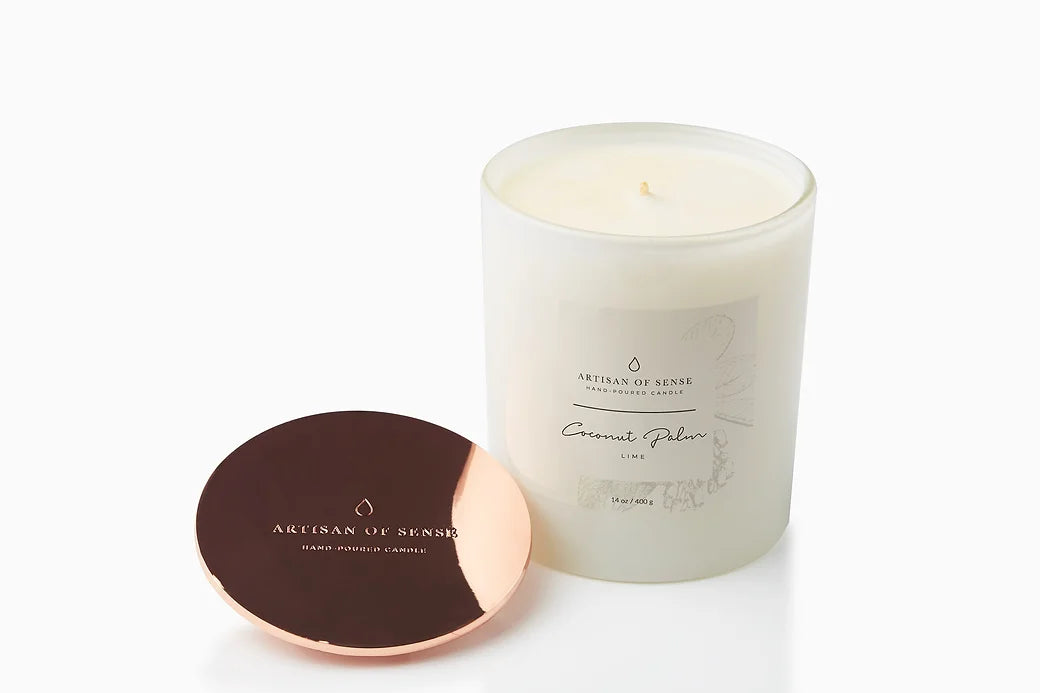 Cotton wick soy candle with the natural scent of Coconut Palm & Lime Soy Candle, arriving in sustainable packaging.
