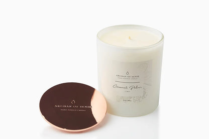 Cotton wick soy candle with the natural scent of Coconut Palm & Lime Soy Candle, arriving in sustainable packaging.
