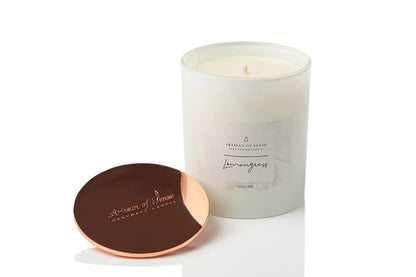 Lemongrass scented soy candle, handcrafted with a cotton wick, in its classic pink box.