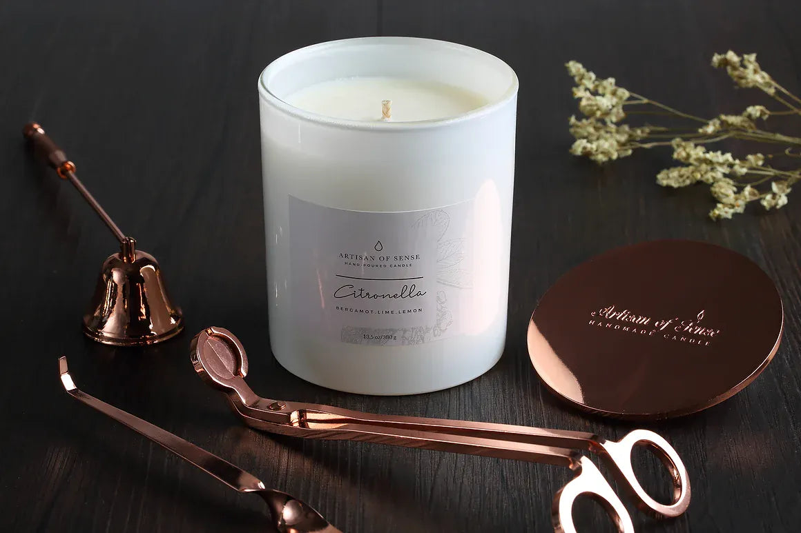 Classically designed wick trimmer, wick dipper, and bell snuffer in Rose Gold or Silver, for elegant candle care.